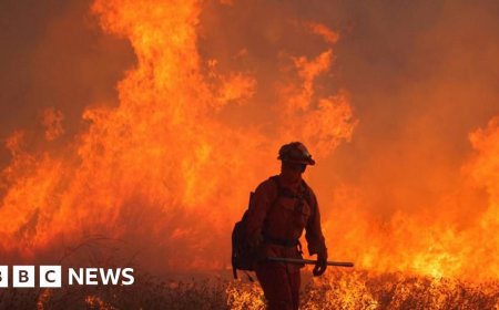 Firefighters battle huge blaze near Los Angeles as winds pick up