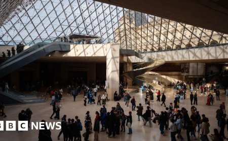 Macron says Mona Lisa to be moved in Louvre overhaul