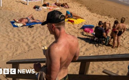 Cover up or pay a fine, Portugal's Albufeira warns