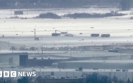Upturned plane lies on Toronto runway after crash