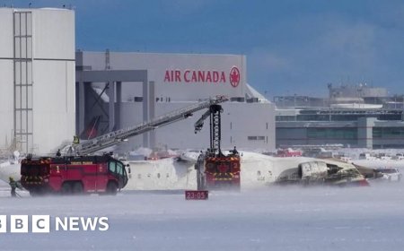 Three critically injured after plane flips at Toronto airport