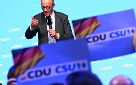 German frontrunner pledges to lead in Europe before key election