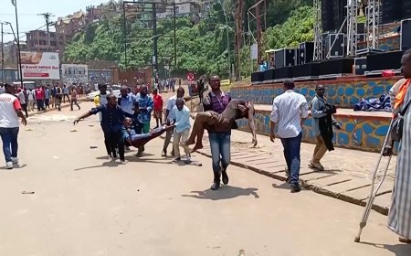 Explosions and gunfire rip through rebel rally in DRC