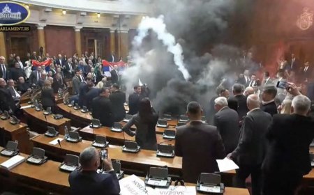 Serbia opposition members throw smoke bombs, flares inside parliament